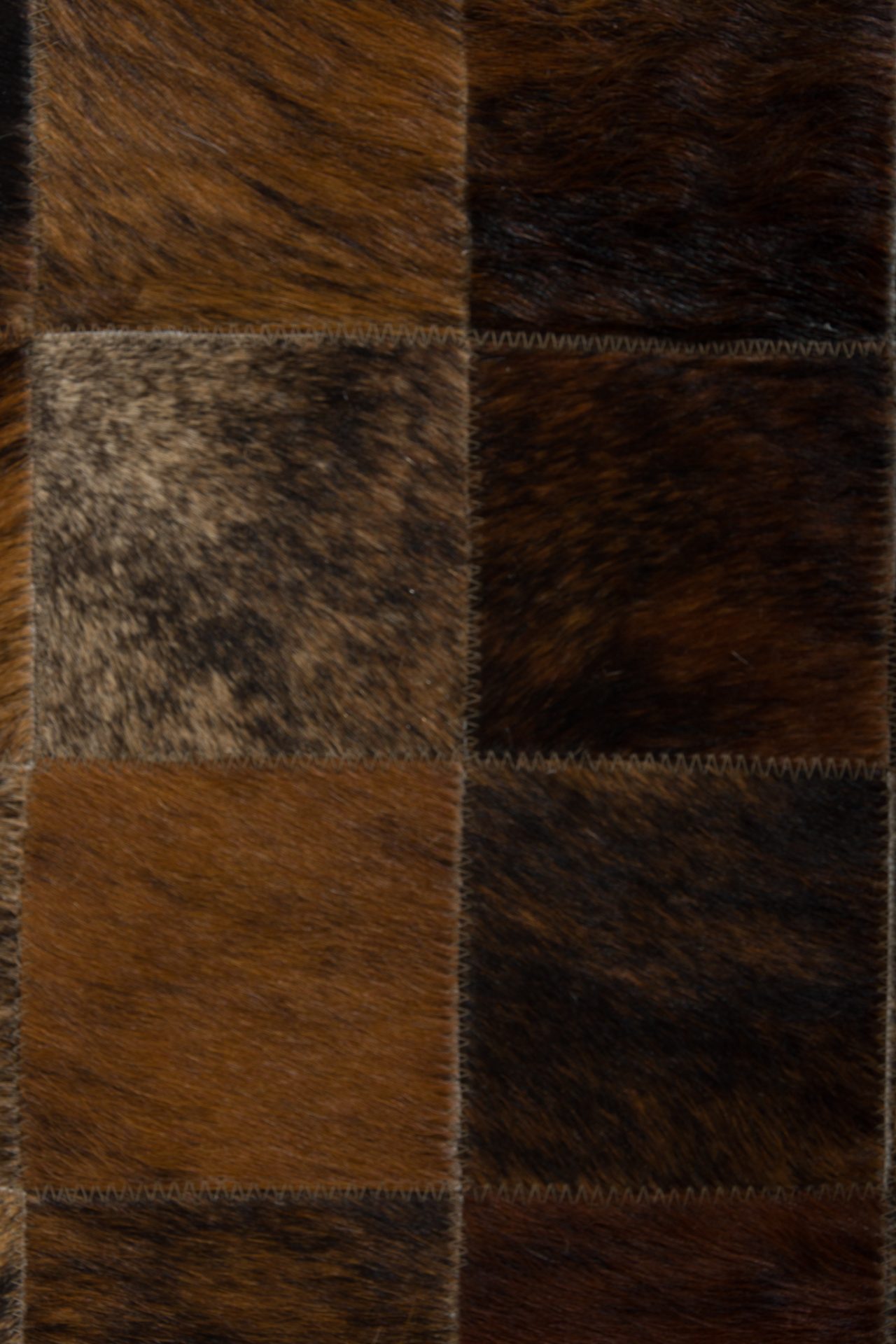 Patchwork Rinderfell Teppich natürlich hochwertig verarbeitet