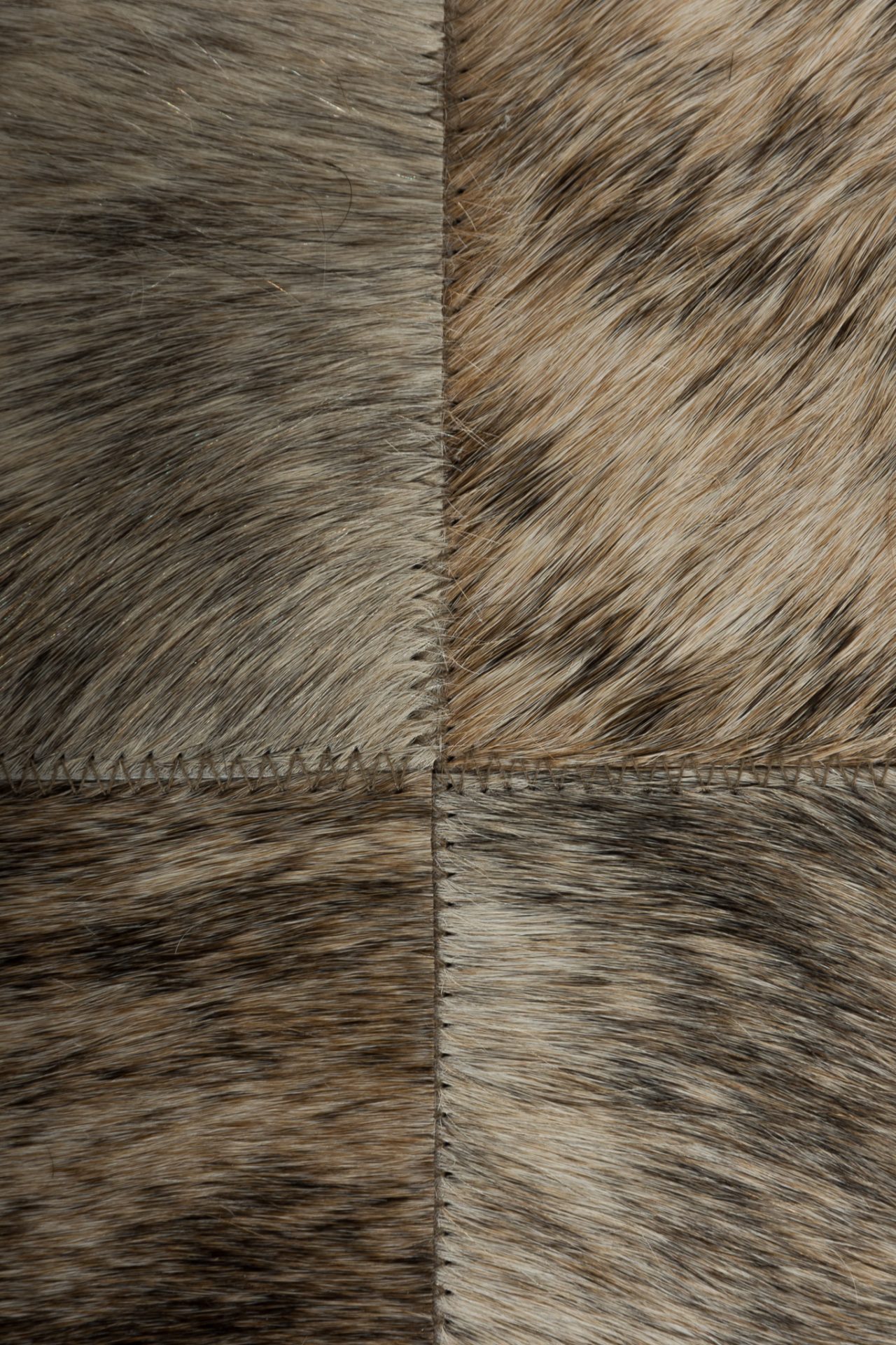 Patchwork Rinderfell Teppich natürlich hochwertig verarbeitet