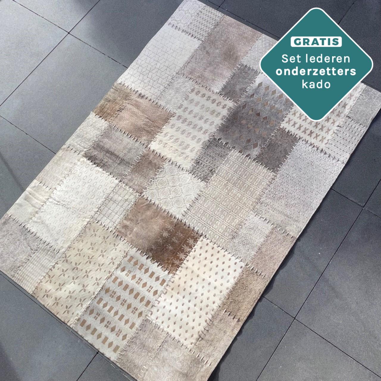 Handgenähter Patchwork Kuhfell Teppich 180x120 cm