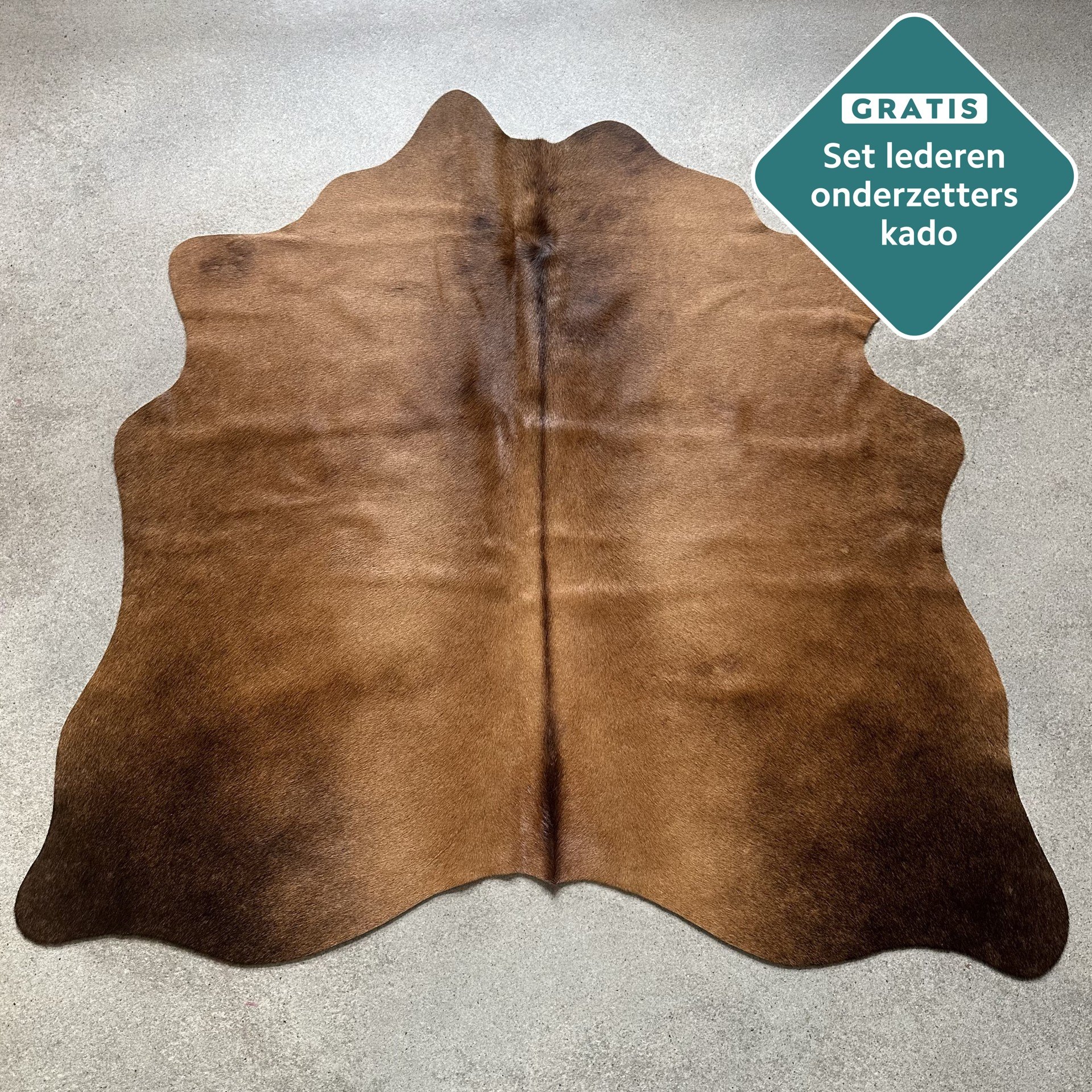 Kleines Kuhfell Teppich dunkel cognac Detailansicht