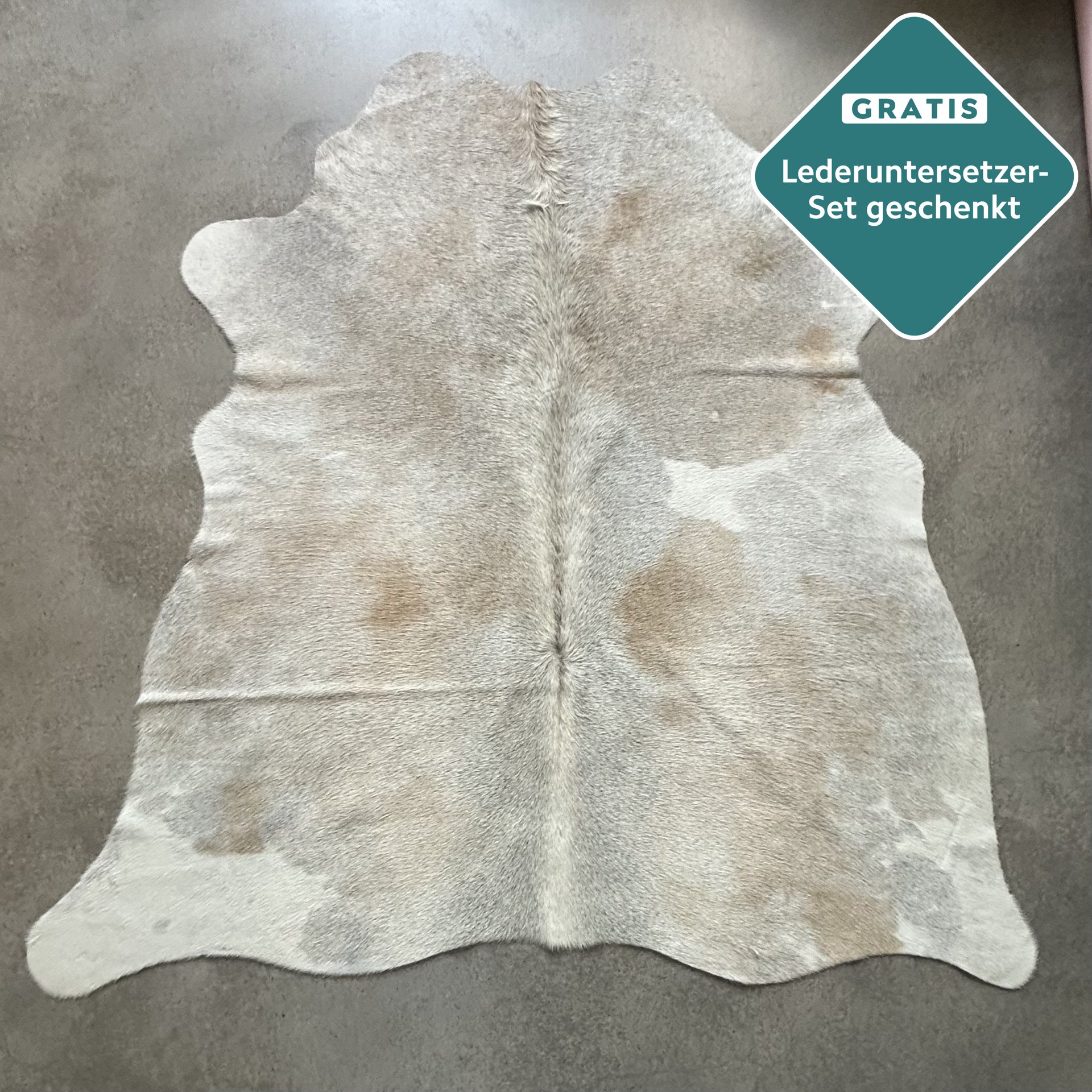 Kleines Kuhfell Teppich taupe grau Detailansicht