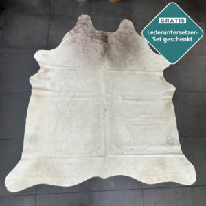 großes Kuhfell Creme Wohnzimmer
